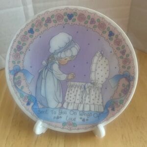 Vintage Precious Moments 4 inch welcome baby plate with stand.